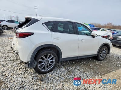 Trzecie zdjęcie samochodu z tyłu: 2021 MAZDA CX-5 GRAND TOURING RESERVE VIN:JM3KFBAY2M0397909 - miniatura