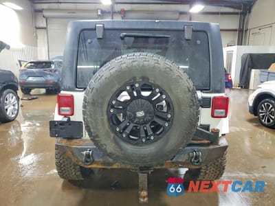 Zdjęcie 6 z 11 samochodu: 2013 JEEP WRANGLER UNLIMITED SAHARA VIN:1C4BJWEG3DL539148 - miniatura