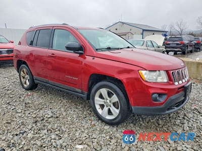 Czwarte zdjęcie samochodu z boku: 2011 JEEP COMPASS SPORT VIN:1J4NF1FBXBD134183 - miniatura
