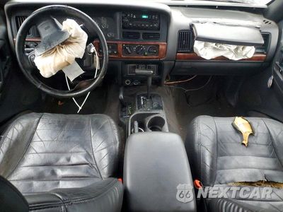 Zdjęcie 15 z 24 samochodu: 1998 JEEP GRAND CHEROKEE LAREDO VIN:1J4GZ48S6WC250636 - miniatura