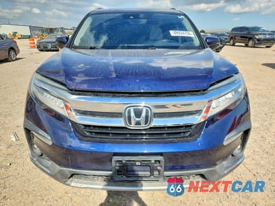 Piąte zdjęcie samochodu w środku: 2022 HONDA PILOT TOURING VIN:5FNYF5H65NB002911 - miniatura