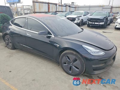 Czwarte zdjęcie samochodu z boku: 2018 TESLA MODEL 3 VIN:5YJ3E1EA5JF171853 - miniatura