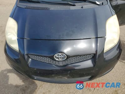 Zdjęcie 11 z 12 samochodu: 2009 TOYOTA YARIS BASE VIN:JTDKT903X95263644 - miniatura