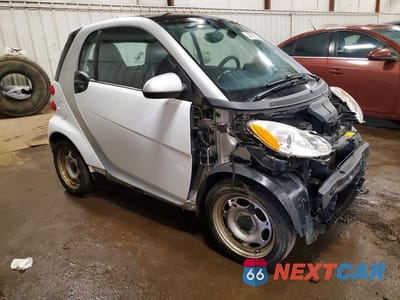 Czwarte zdjęcie samochodu z boku: 2015 SMART FORTWO PURE VIN:WMEEJ3BAXFK791906 - miniatura