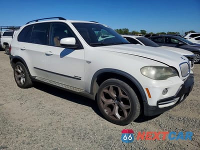Czwarte zdjęcie samochodu z boku: 2010 BMW X5 XDRIVE48I VIN:5UXFE8C59AL312575 - miniatura