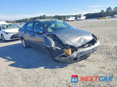 Czwarte zdjęcie samochodu z boku: 2006 FORD FOCUS VIN:1FAFP34N46W188482 - miniatura