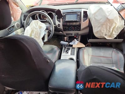 Zdjęcie 8 z 12 samochodu: 2015 TOYOTA TACOMA V6 VIN:3TMLU4EN7FM186283 - miniatura