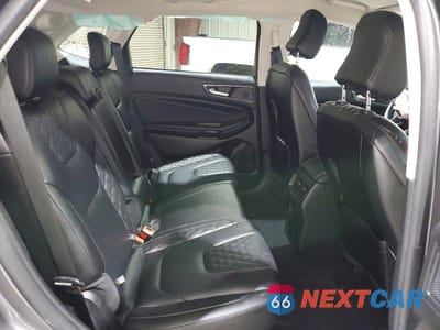 Zdjęcie 11 z 13 samochodu: 2024 FORD EDGE TITANIUM VIN:2FMPK4K99RBA02431 - miniatura