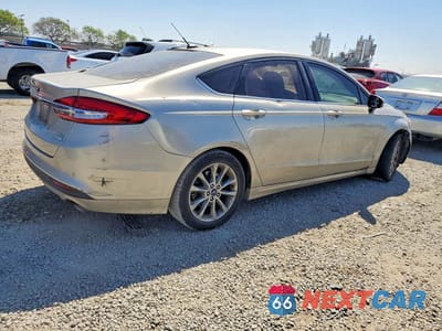 Trzecie zdjęcie samochodu z tyłu: 2017 FORD FUSION SE VIN:3FA6P0HDXHR293565 - miniatura