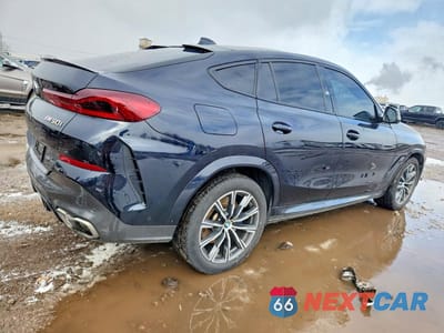 Trzecie zdjęcie samochodu z tyłu: 2020 BMW X6 M50I VIN:5UXCY8C00L9D66297 - miniatura