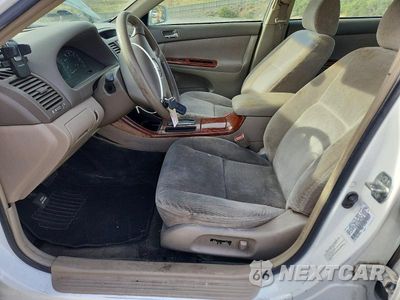 Zdjęcie 7 z 12 samochodu: 2002 TOYOTA CAMRY XLE VIN:4T1BE32K32U061652 - miniatura