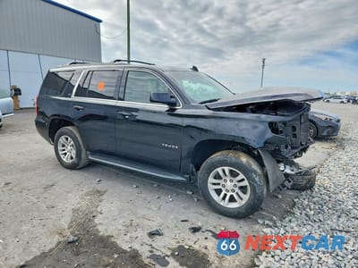 Czwarte zdjęcie samochodu z boku: 2019 CHEVROLET TAHOE K1500 LT VIN:1GNSKBKC2KR377456 - miniatura