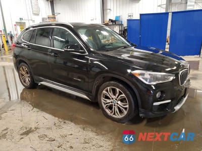 Czwarte zdjęcie samochodu z boku: 2018 BMW X1 XDRIVE28I VIN:WBXHT3C39J5K28751 - miniatura