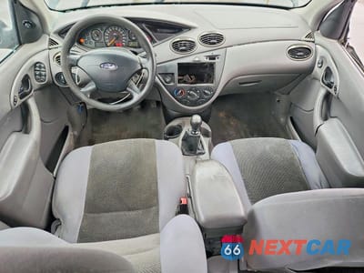 Zdjęcie 8 z 12 samochodu: 2004 FORD FOCUS SE VIN:1FAFP36354W153894 - miniatura