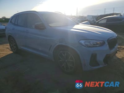 Czwarte zdjęcie samochodu z boku: 2022 BMW X3 M40I VIN:5UX83DP05N9M55127 - miniatura