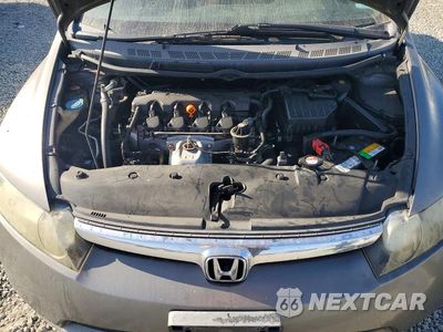 Zdjęcie 11 z 12 samochodu: 2006 HONDA CIVIC LX VIN:1HGFA16566L103352 - miniatura