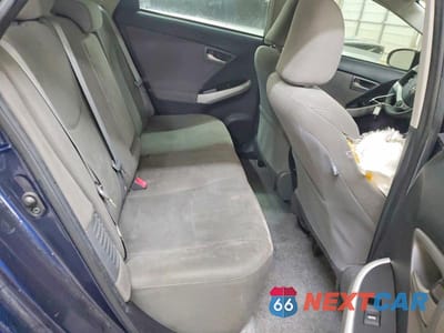 Zdjęcie 11 z 13 samochodu: 2015 TOYOTA PRIUS TWO VIN:JTDKN3DU0F1873999 - miniatura