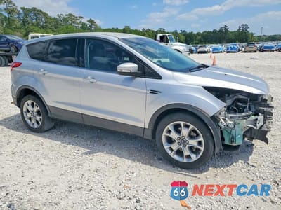 Czwarte zdjęcie samochodu z boku: 2013 FORD ESCAPE SEL VIN:1FMCU0HX7DUB39300 - miniatura