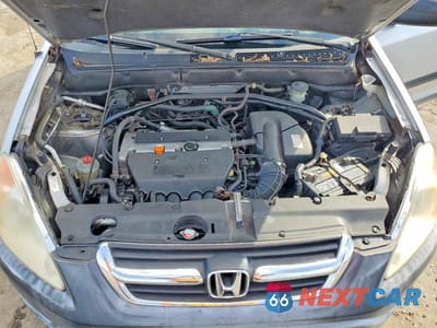 Zdjęcie 12 z 12 samochodu: 2002 HONDA CR-V LX VIN:JHLRD78462C075303 - miniatura