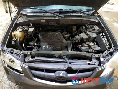 Zdjęcie 12 z 13 samochodu: 2003 MAZDA TRIBUTE LX VIN:4F2YZ941X3KM47248 - miniatura