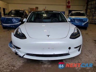 Piąte zdjęcie samochodu w środku: 2022 TESLA MODEL 3 VIN:5YJ3E1EB9NF240848 - miniatura