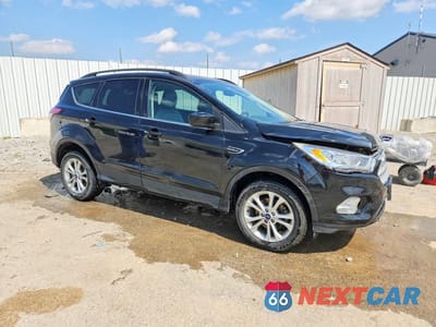 Czwarte zdjęcie samochodu z boku: 2018 FORD ESCAPE SEL VIN:1FMCU0HD1JUB59754 - miniatura