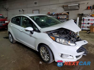 Czwarte zdjęcie samochodu z boku: 2014 FORD FIESTA SE VIN:3FADP4EJ3EM103624 - miniatura