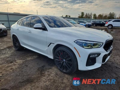 Czwarte zdjęcie samochodu z boku: 2021 BMW X6 M50I VIN:5UXCY8C01M9E79306 - miniatura