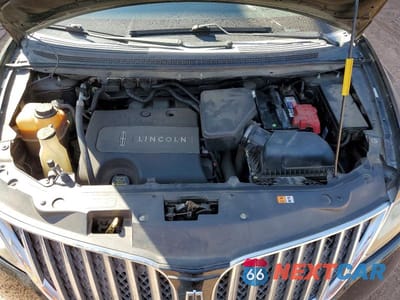 Zdjęcie 12 z 13 samochodu: 2013 LINCOLN MKX VIN:2LMDJ8JK9DBL12545 - miniatura