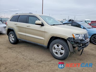 Czwarte zdjęcie samochodu z boku: 2011 JEEP GRAND CHEROKEE LAREDO VIN:1J4RR4GG5BC565055 - miniatura