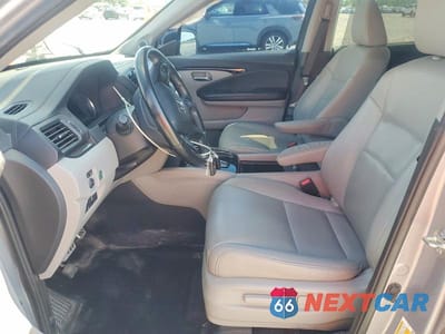 Zdjęcie 7 z 14 samochodu: 2019 HONDA PILOT TOURING VIN:5FNYF5H62KB010802 - miniatura