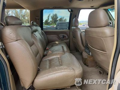 Zdjęcie 11 z 12 samochodu: 1996 GMC SUBURBAN K1500 VIN:1GKFK16R2TJ733816 - miniatura