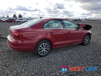 Trzecie zdjęcie samochodu z tyłu: 2017 VOLKSWAGEN JETTA SE VIN:3VWDB7AJ3HM403553 - miniatura