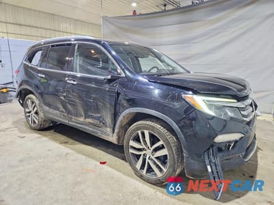 Czwarte zdjęcie samochodu z boku: 2018 HONDA PILOT ELITE VIN:5FNYF6H04JB044563 - miniatura