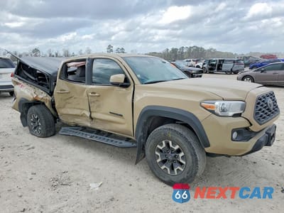 Czwarte zdjęcie samochodu z boku: 2020 TOYOTA TACOMA TRD OFF-ROAD VIN:3TMCZ5AN4LM300250 - miniatura