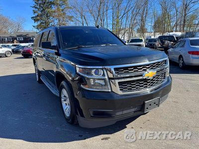 Czwarte zdjęcie samochodu z boku: 2015 CHEVROLET SUBURBAN K1500 LT VIN:1GNSKJKC9FR160325 - miniatura