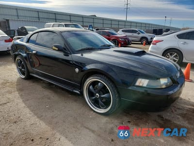 Czwarte zdjęcie samochodu z boku: 2004 FORD MUSTANG VIN:1FAFP40624F165607 - miniatura