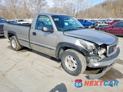 Czwarte zdjęcie samochodu z boku: 2000 GMC NEW SIERRA C1500 VIN:1GTEC14V1YE399413 - miniatura