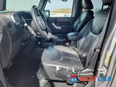 Zdjęcie 7 z 12 samochodu: 2014 JEEP WRANGLER UNLIMITED RUBICON VIN:1C4BJWFG9EL186317 - miniatura