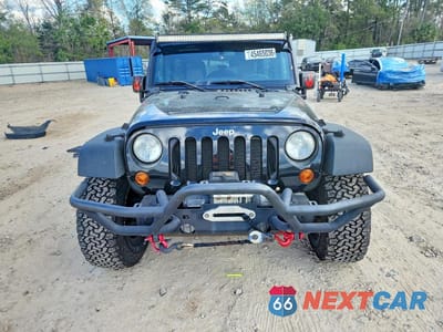 Piąte zdjęcie samochodu w środku: 2011 JEEP WRANGLER UNLIMITED RUBICON VIN:1J4HA6H13BL585863 - miniatura