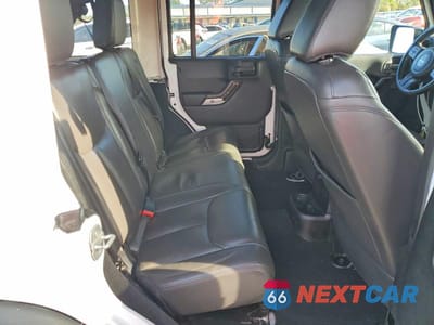 Zdjęcie 11 z 12 samochodu: 2015 JEEP WRANGLER UNLIMITED SAHARA VIN:1C4BJWEG0FL504456 - miniatura