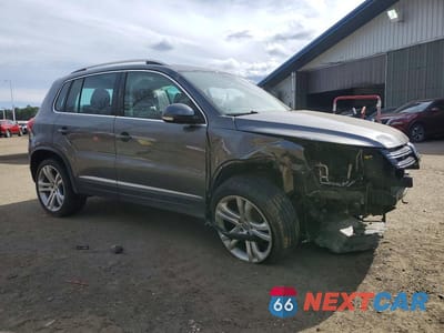 Czwarte zdjęcie samochodu z boku: 2016 VOLKSWAGEN TIGUAN S VIN:WVGBV7AX6GW615380 - miniatura