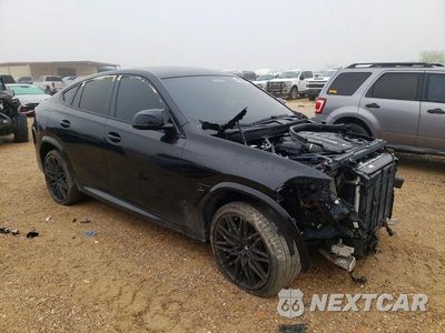Czwarte zdjęcie samochodu z boku: 2021 BMW X6 M VIN:5YMCY0C09M9E09840 - miniatura