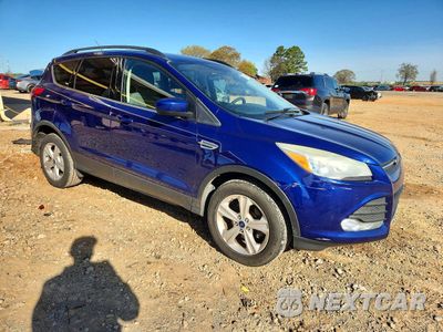 Czwarte zdjęcie samochodu z boku: 2016 FORD ESCAPE SE VIN:1FMCU0GX0GUC35890 - miniatura