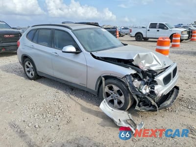 Czwarte zdjęcie samochodu z boku: 2014 BMW X1 SDRIVE28I VIN:WBAVM1C58EVW49415 - miniatura