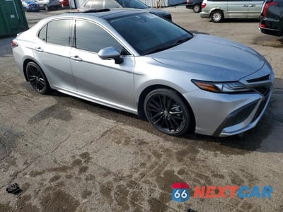 Czwarte zdjęcie samochodu z boku: 2021 TOYOTA CAMRY XSE VIN:4T1K61AK0MU552556 - miniatura