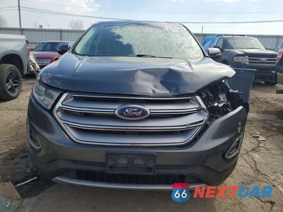 Piąte zdjęcie samochodu w środku: 2017 FORD EDGE TITANIUM VIN:2FMPK4K80HBC60486 - miniatura