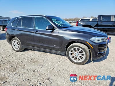 Czwarte zdjęcie samochodu z boku: 2014 BMW X5 XDRIVE35I VIN:5UXKR0C57E0H20541 - miniatura