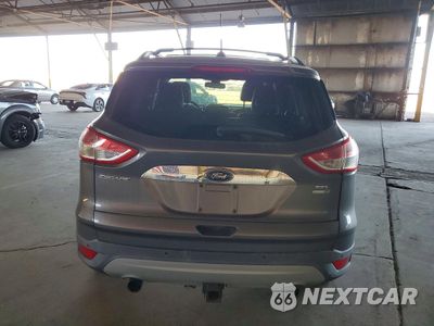 Zdjęcie 6 z 12 samochodu: 2013 FORD ESCAPE SEL VIN:1FMCU9H99DUB15831 - miniatura