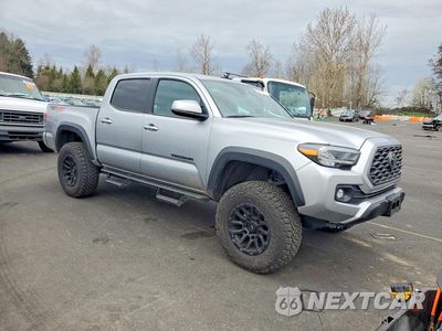Czwarte zdjęcie samochodu z boku: 2023 TOYOTA TACOMA TRD OFF-ROAD VIN:3TMCZ5AN4PM621842 - miniatura